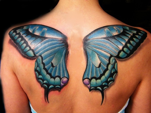 Tattoo Wings (ala) a l'esquena: significat per a noies i homes. Una foto