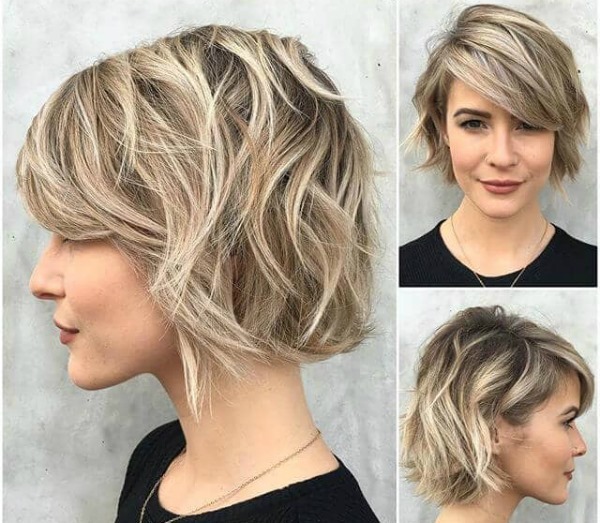 Coupes de cheveux avec frange latérale pour cheveux moyens et volume à la couronne. Photo femmes